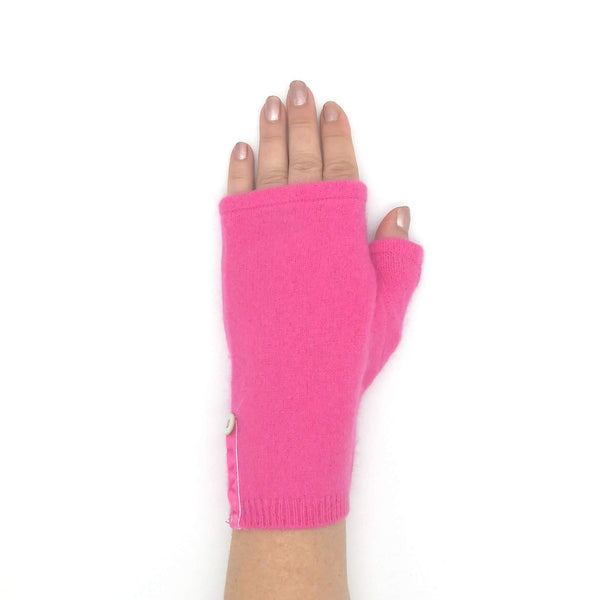 Fingerless Kitten Mitten in Barbie pink on woman's hand