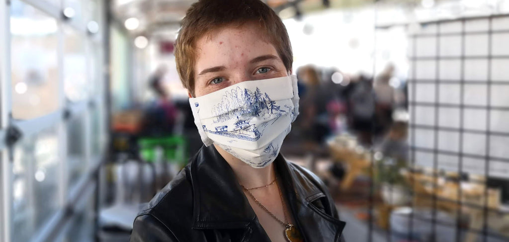 Person wearing NW ferries cotton face mask