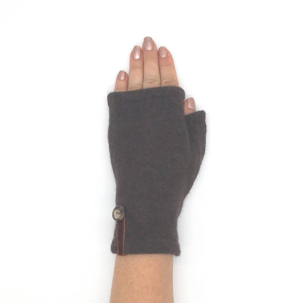 Woman's hand wearing short recycled dark brown cashmere sweater mitten