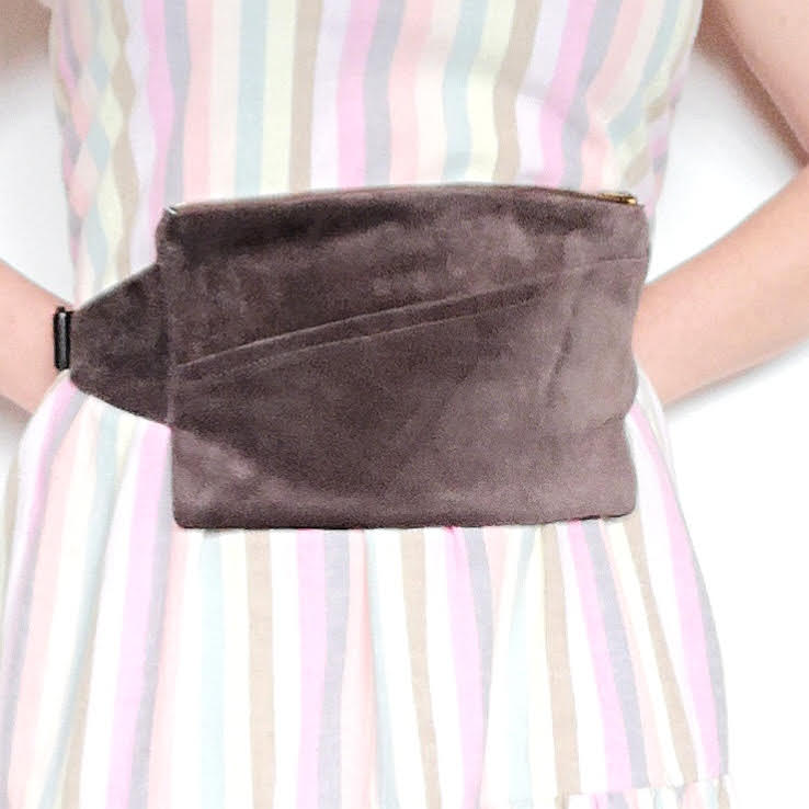 Fringe Vintage dark brown leather fanny pack around a woman's waist
