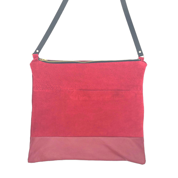 Red recycled leather and suede crossbody bag by Fringe Vintage Leather