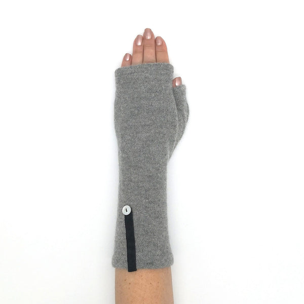 Recycled grey cashmere fingerless sweater mitten on woman's hand