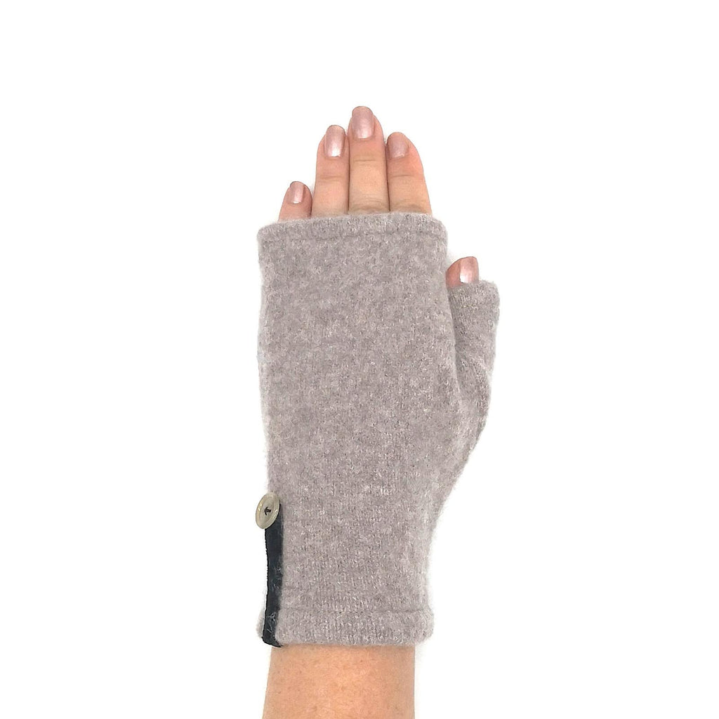 Fawn cashmere fingerless mittens on woman's hand