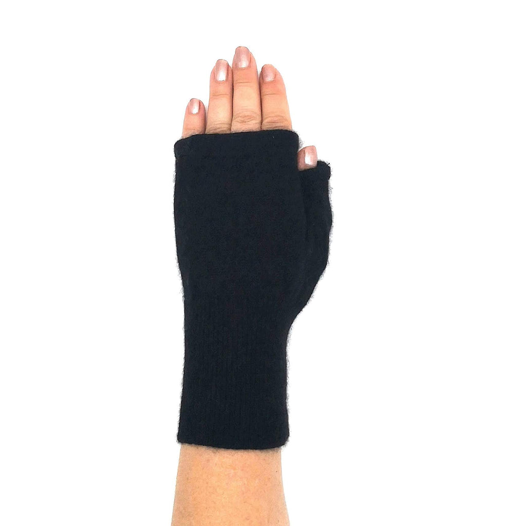 Woman's hand wearing short black cashmere fingerless glove with no trim