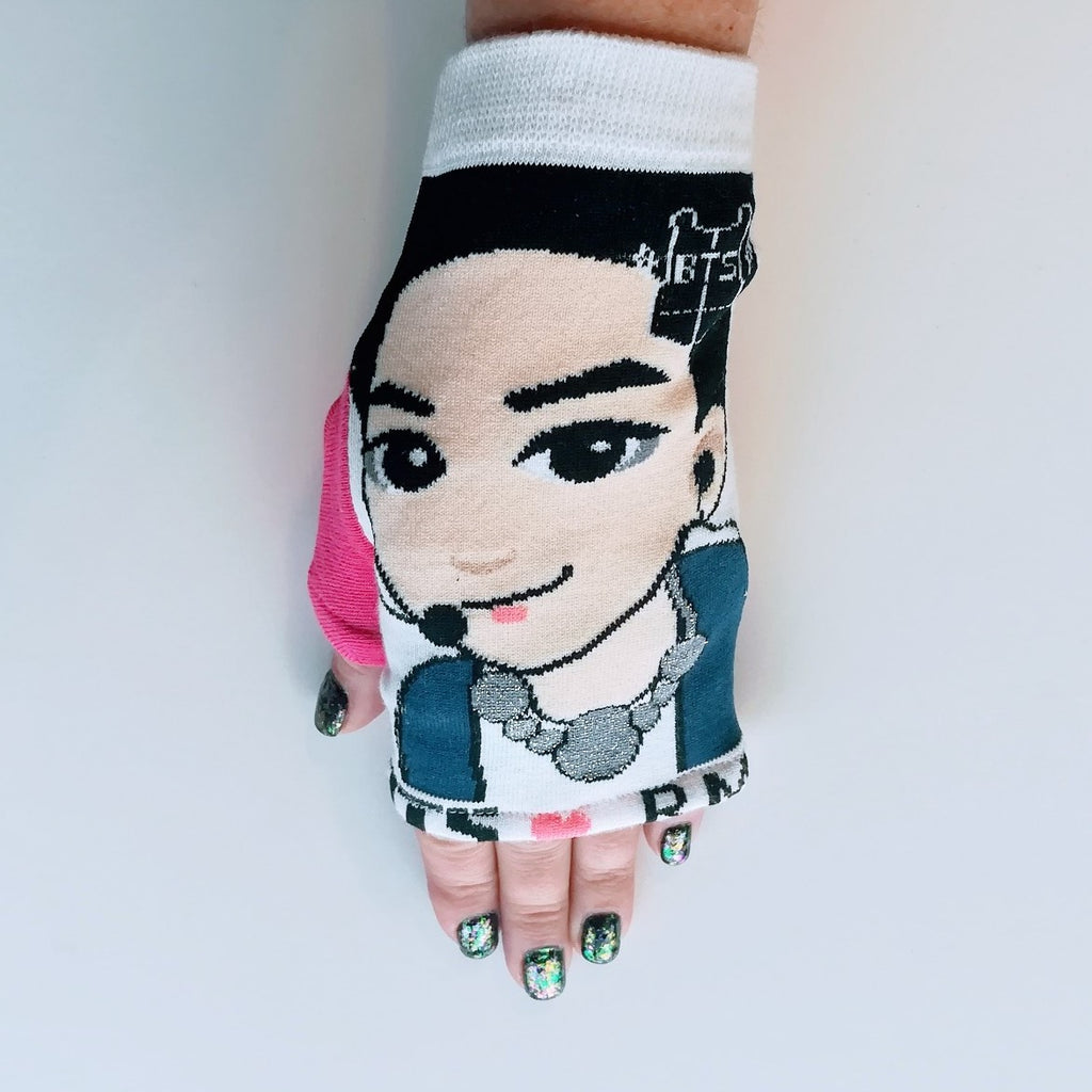 Hand in wrist-length fingerless gloves made from H-Mart BTS RM graphic socks